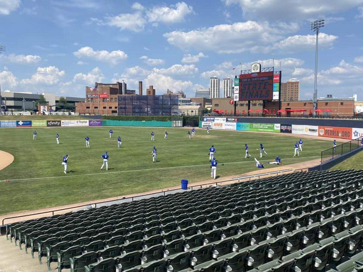 The Columbia baseball team warms up prior to their semifinal game in the IHSA Class 2A state tournament. The Eagles face Joliet Catholic Academy in the championship game Saturday night.
