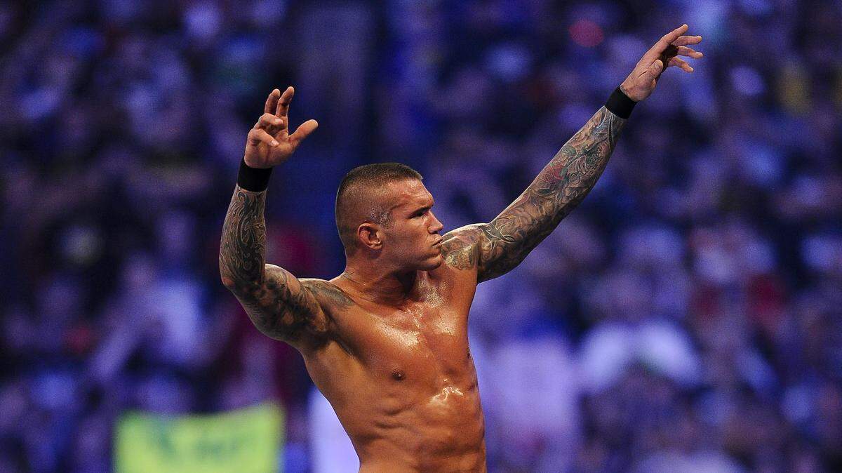 In this Sunday, April 3, 2011, file photo, WWE Superstar Randy Orton celebrates defeating CM Punk (not pictured) during WrestleMania XXVII at the Georgia Dome in Atlanta, Georgia.