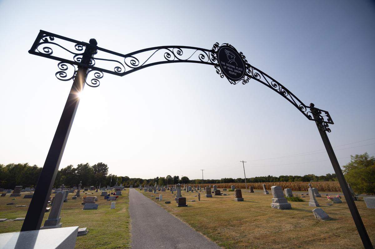 The entrance to the Union Miners Cemetery in Mount Olive, Ill. on Sept. 10, 2024. The sign at the top reads “the resting place of real union people.” Thousands of graves serve as a testament to Mother Jones’s organizing efforts in the late 19th and early 20th century.