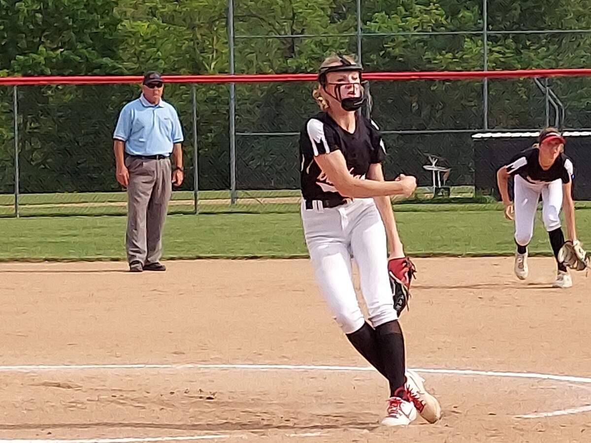 Highland pitcher Sophia Donoho delivers a pitch during a Mississippi Valley Conference game against host Triad. Donoho helped the Lady Bulldogs beat Triad for the second time this season and clinch their second consecutive MVC championship.
