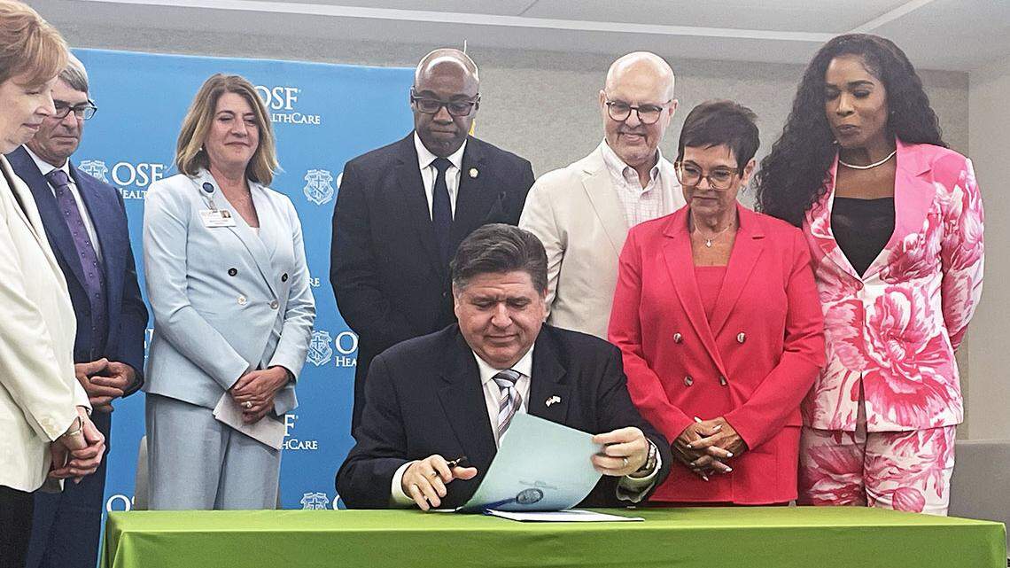 Pritzker signs bills to control prescription costs, expand insurance coverage