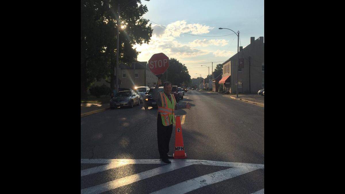 Michael Kish, principal at Immaculate Conception Catholic School in Columbia, has been known to paint classrooms, fix clogged toilets and serve as a crossing guard when needed.