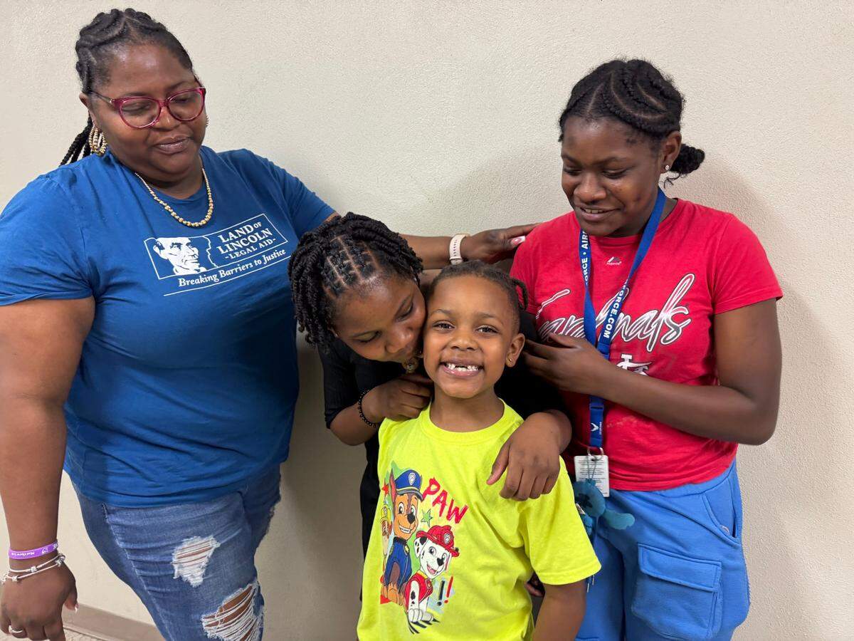 Ceonica Scott with her children (left to right) Makenzie Dodd, Cali Baker and Makyia Dodd. Cali Baker is in first grade -- just one year away from being eligible for the 21st Century after-school program at the Wyvetter Younge School of Excellence. Now that program is in jeopardy of closing before he can attend.