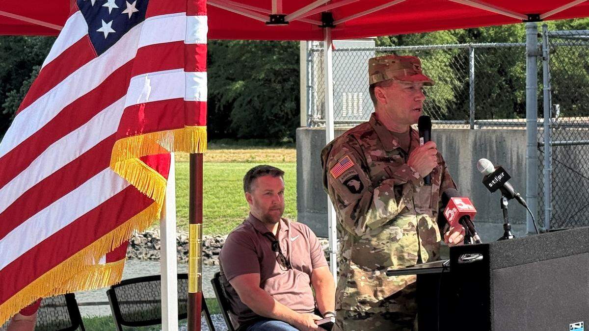 Col. Andy Pannier, commander of the Army Corps’ St. Louis district, speaks at the ribbon-cutting ceremony on Friday alongside Kevin Williams, the executive director of the Wood River Drainage and Levee District.