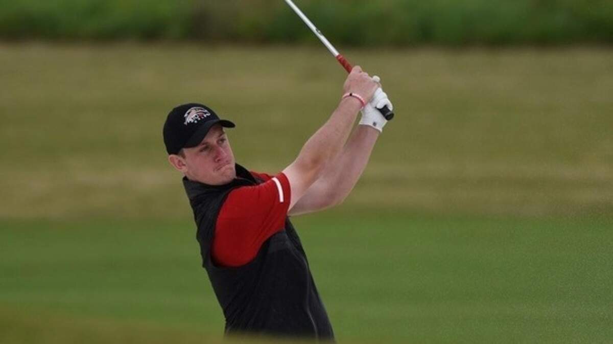 SIUE golfer Danny Gorman follows through on a chip shot.