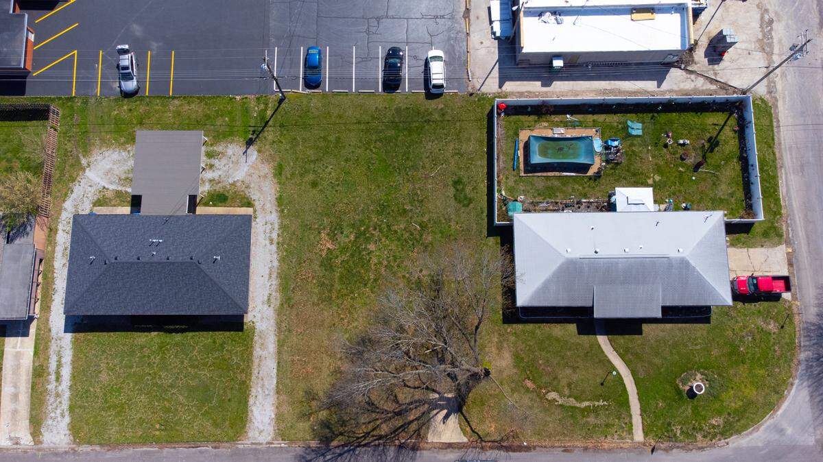 This drone photo shows a vacant lot at 24 Queensway Drive in Belleville, which C.A. Jones Inc. bought from the city for $1. The construction company is under contract to build a two-story home with a one-car garage on it.