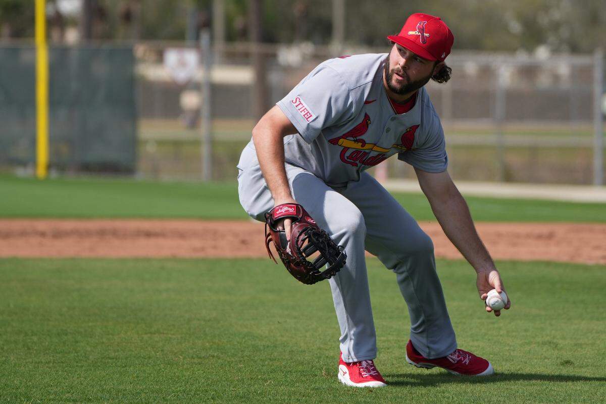 Feb 17, 2025; Jupiter, FL, USA;  St. Louis Cardinals outfielder Alec Burleson (41) takes infield practice during spring training. Mandatory Credit: Jim Rassol-Imagn Images