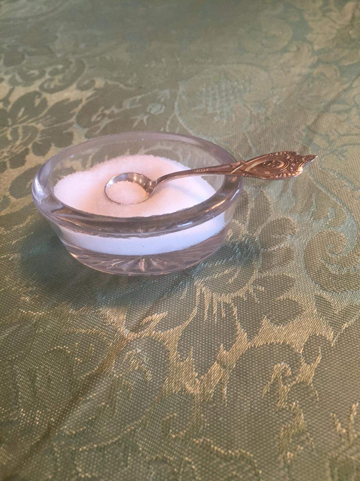 Because sea salt is flakier and some chefs feel it should not be ground because it would lose it's flavor, one now sees the return of individual Victorian-type salt cellars in many restaurants, including the tiny little salt spoon.