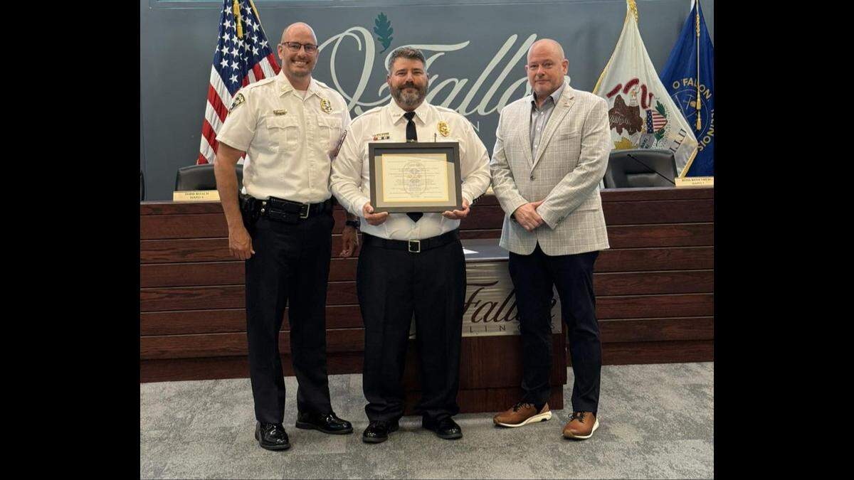Kirk Brueggeman, director of public safety; EMS Chief Jeremy Sherman,’ and Mayor Eric Van Hook
