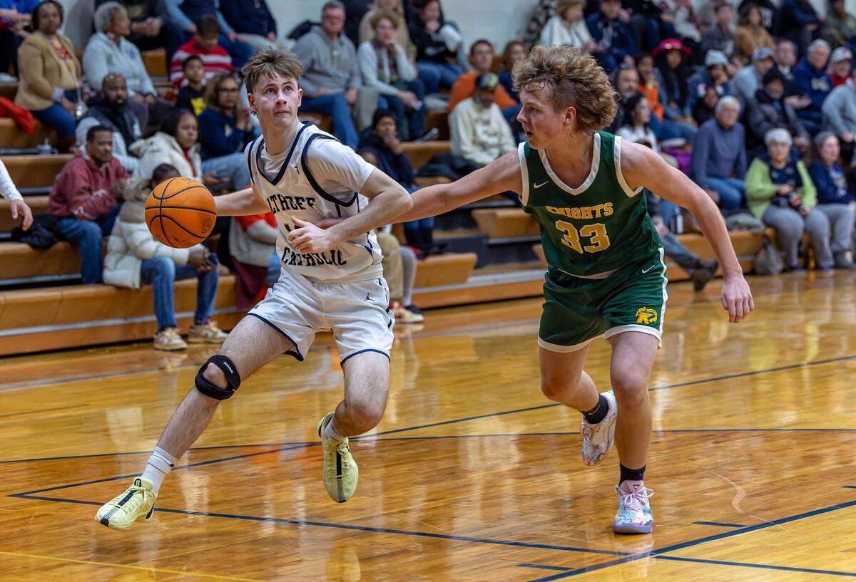 Althoff’s Luke Smith drives to the basket during against Metro-East Lutheran on Friday, Feb. 21.