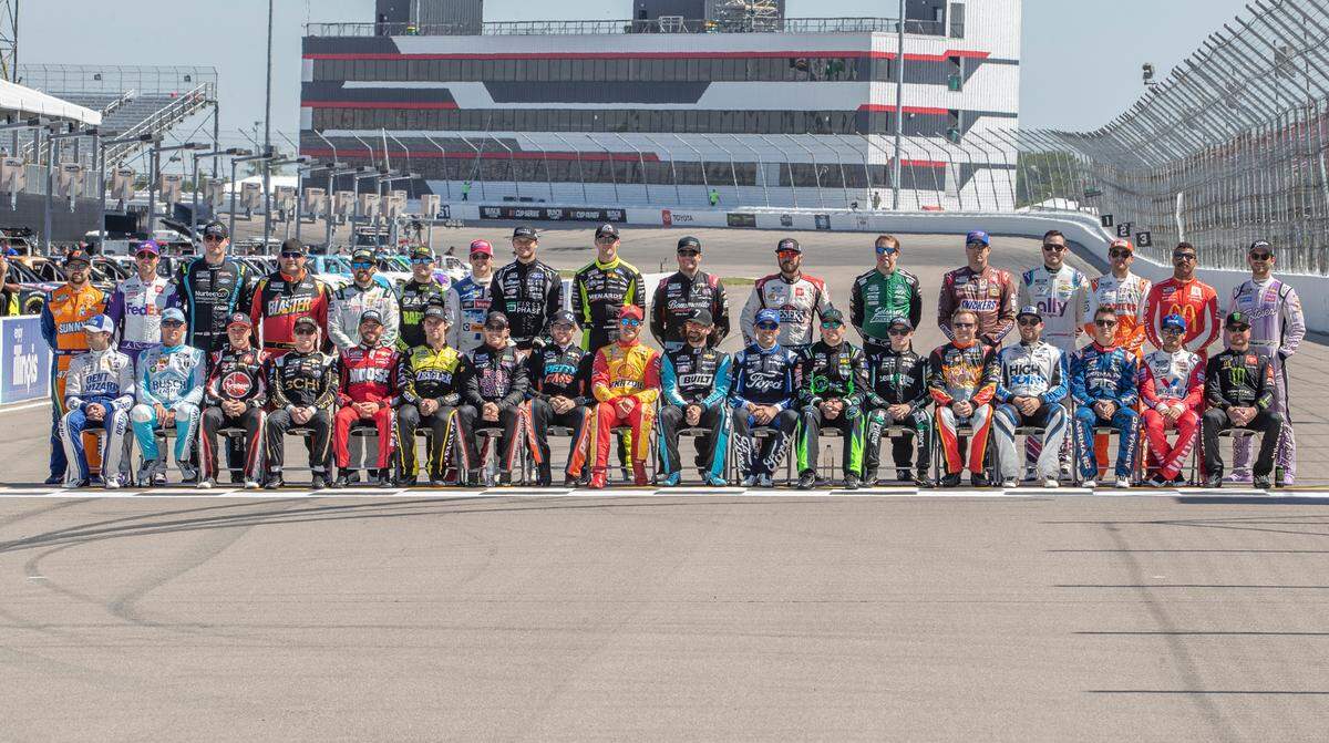 NASCAR drivers for the World Wide Technology Raceway NASCAR Cup Series Enjoy Illinois 300 pose for a group photo.
