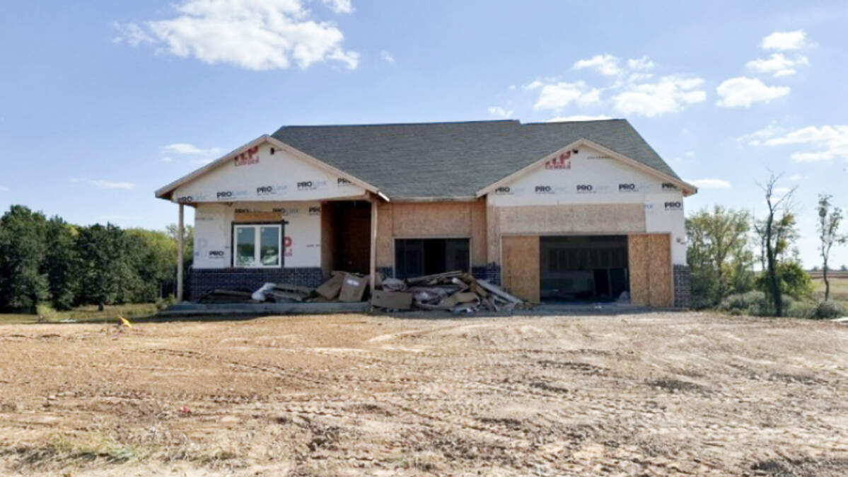 A lawsuit in Sangamon County Circuit Court alleges that metro-east contractor C.A. Jones, Inc. abandoned this half-constructed home in Chatham last year, leaving a financial mess for the couple buying it.