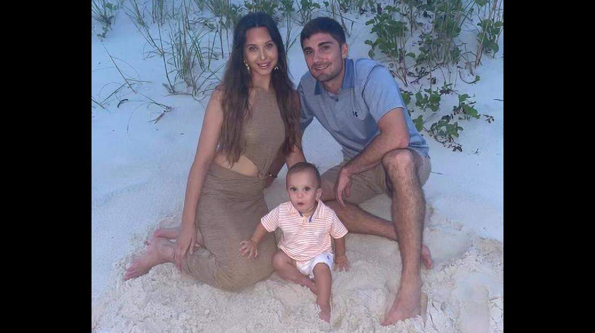 Clayton Augustine, 27, is pictured with his fiance, Sarah Lamonica, and their son, Nolan, at the beach. Augustine died of an overdose on Oct. 20, 2021. A family friend pleaded guilty to drug-induced homicide on April 11.