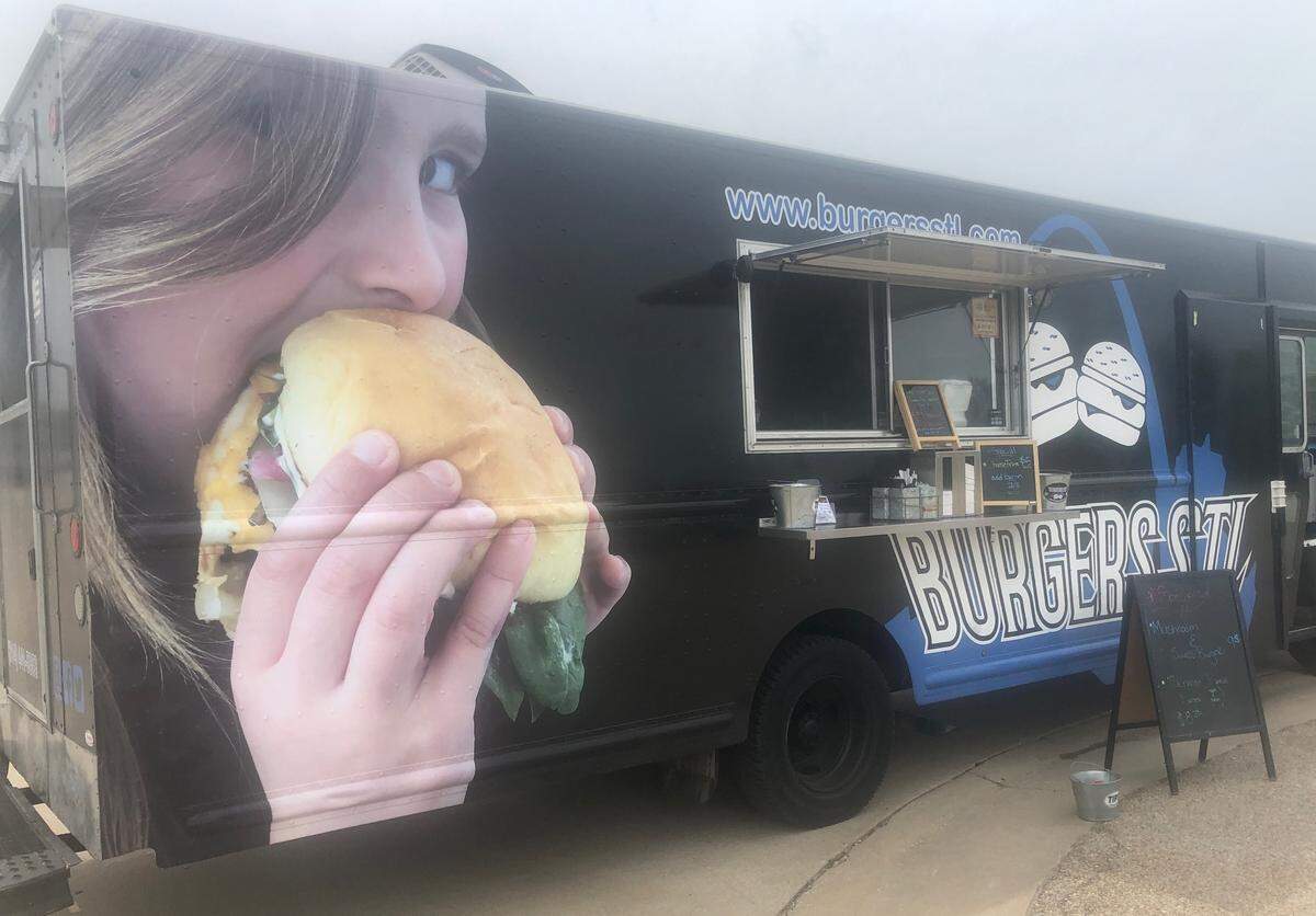 The 31-foot-long Burgers STL food truck features an image of the Gateway Arch and a giant photo of owner Matt Foley’s 6-year-old daughter, Sophia, eating a burger.