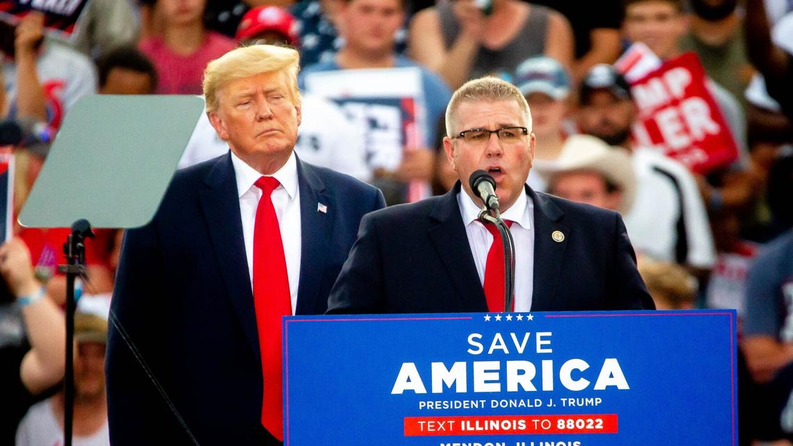 Illinois State Sen. Darren Bailey (R-Xenia) speaks next to former President Donald Trump, who endorsed Bailey for Illinois’ gubernatorial race.