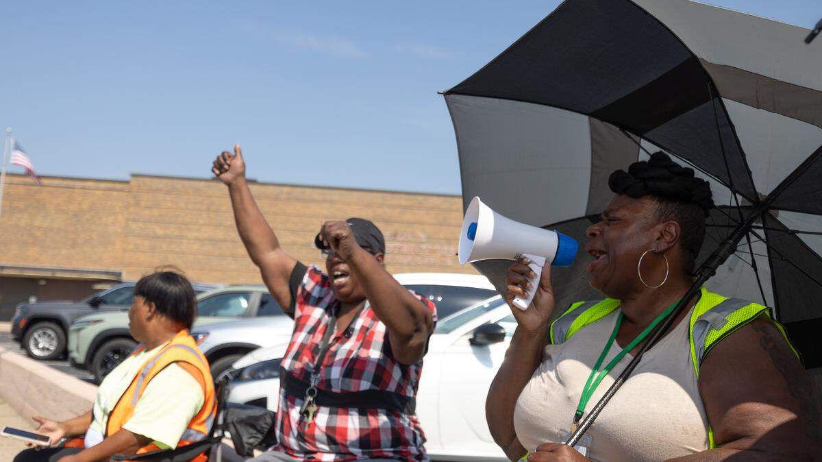 Marsha Jones, a former bus driver, speaks during a protest to air grievances against Illinois Central School Bus’ facility in Caseyville.