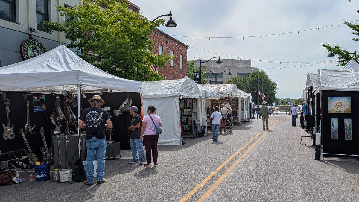 Art on the Square 2026 kicked off Friday afternoon in downtown Belleville as folks arrived early to look at different artworks, including metal sculptures by artist Mark Dietzel (at left).