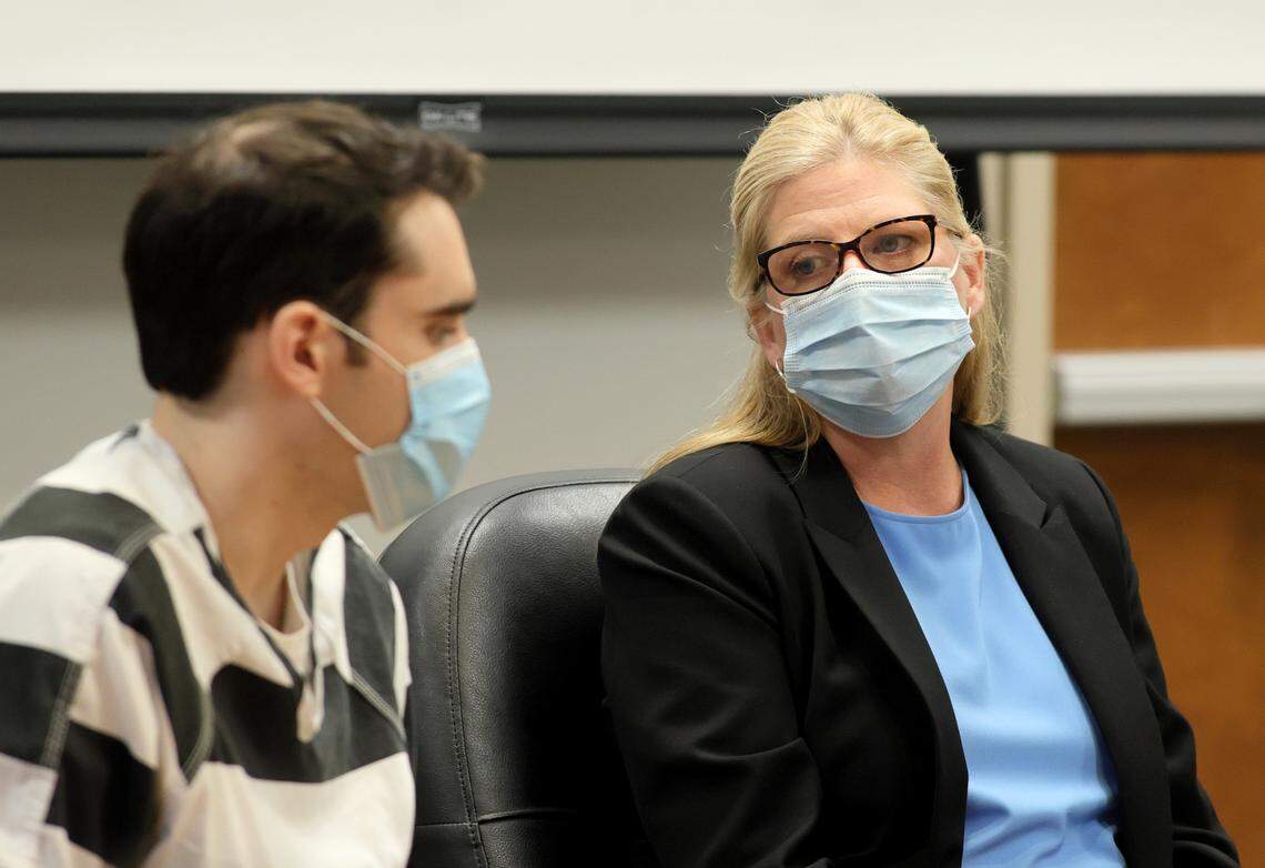 Timothy Banowetz, left, and his former public defender Mary Copeland take questions from the judge at the start of Banowetz’s sentencing hearing in an Edwardsville courtroom on Friday, Dec. 10, 2021. Earlier this year Banowetz pleaded guilty to the January 2020 murder of Randy Gori and robbing Gori’s two children. Copeland, Madison County’s Chief Public Defender, had been representing Banowetz until he told the judge he wished to represent himself at the start of the hearing on Friday.