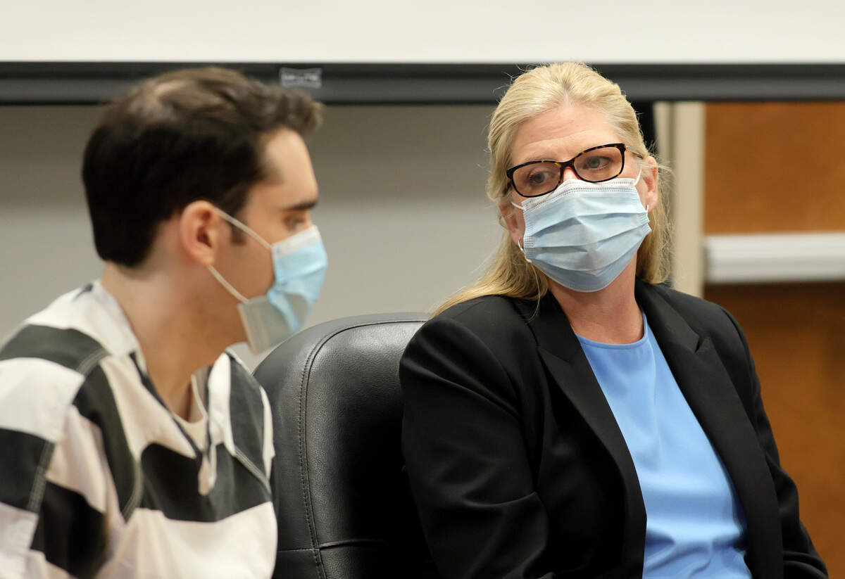 Timothy Banowetz, left, and his former public defender Mary Copeland take questions from the judge at the start of Banowetz’s sentencing hearing in an Edwardsville courtroom on Friday, Dec. 10, 2021. Earlier this year Banowetz pleaded guilty to the January 2020 murder of Randy Gori and robbing Gori’s two children. Copeland, Madison County’s Chief Public Defender, had been representing Banowetz until he told the judge he wished to represent himself at the start of the hearing on Friday.