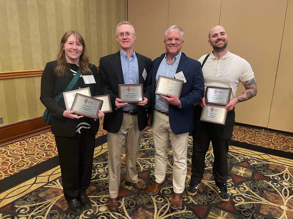 Belleville News-Democrat staff at the Illinois Press Association awards dinner included, left to right, Investigative Reporter Lexi Cortes, Senior Reporter Mike Koziatek, Executive Editor Todd Eschman, and visual journalist Joshua Carter.