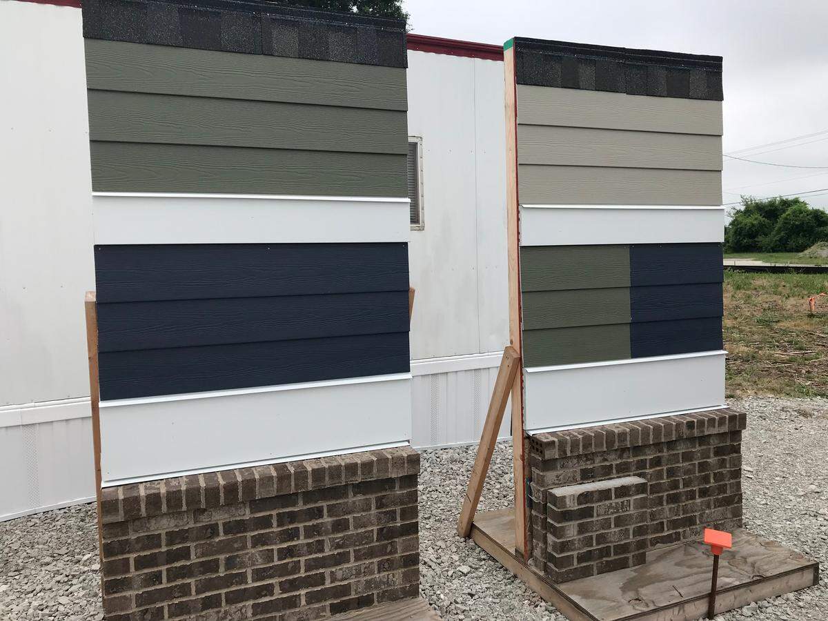 This is what the exterior siding options of the 216 units in the nine apartment buildings of the Thirteen01 at Hartman Lakes multi-family development off Hartman and Thouvenot lanes in Shiloh.