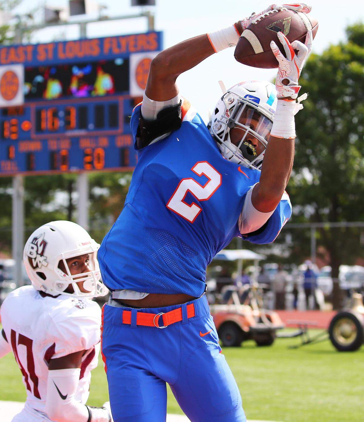 East St. Louis’ Antonio Johnson hauls in a touchdown pass in a victory over Belleville West at Clyde C. Jordan Saturday.