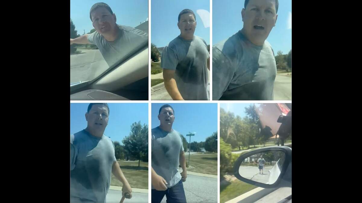 Screenshots from a video taken by a St. Louis delivery driver on Aug. 16 on Roan Hill Drive in Belleville show an angry man confronting her through the rolled-up window of her vehicle. Police have confirmed the man is a firefighter.