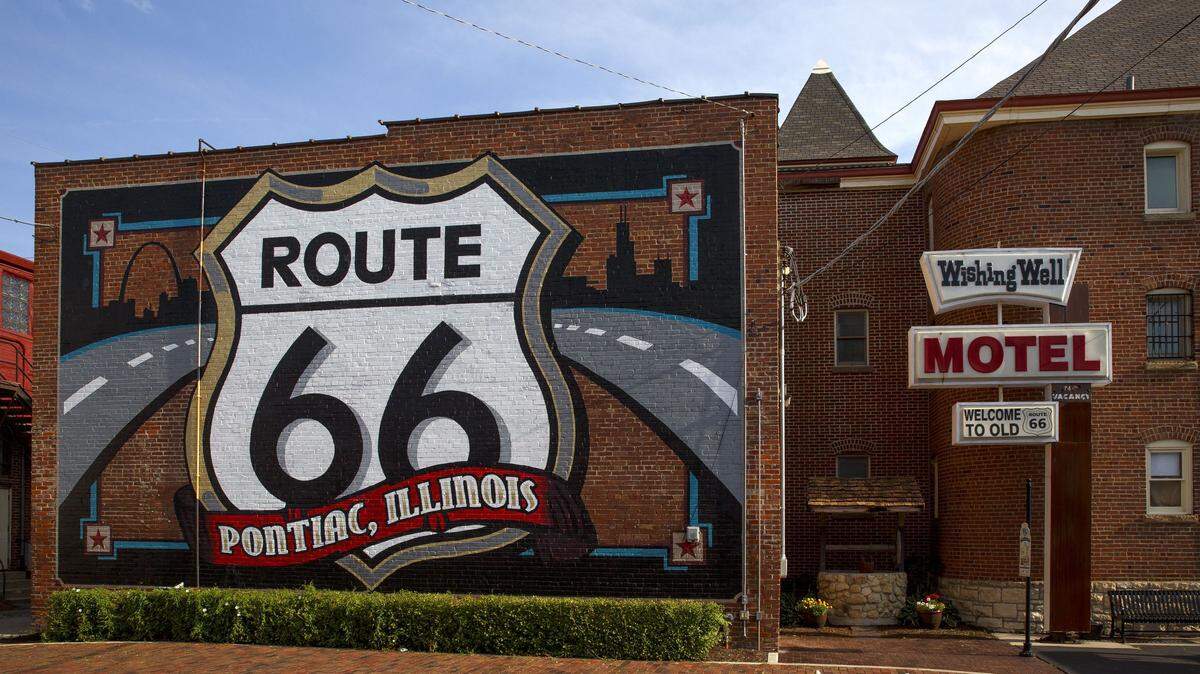The Route 66 logo fills the wall at the rear of the Route 66 Hall of Fame & Museum in Pontiac.
