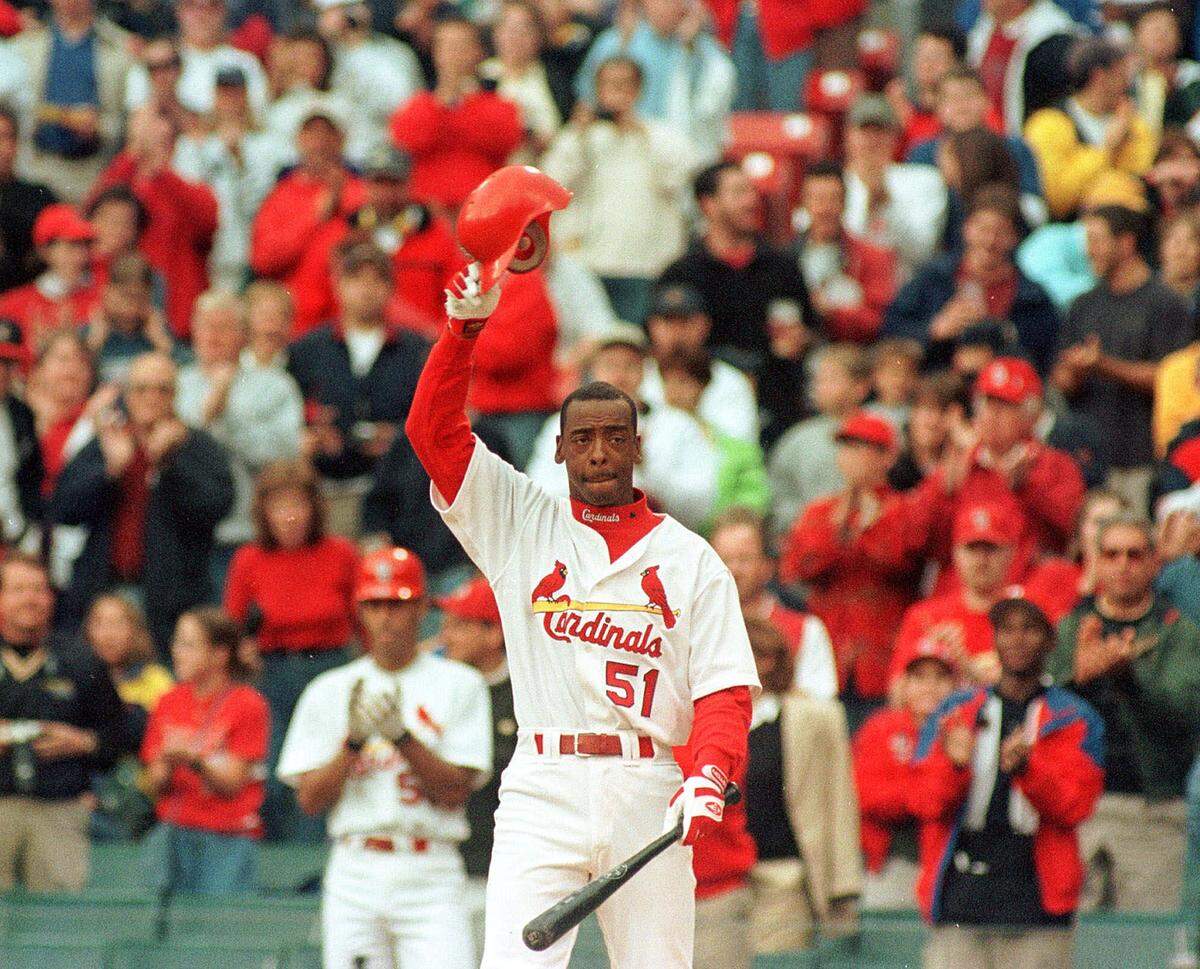 Willie McGee waves to the crowd as he comes to bat as a pinch hitter in the fourth inning against the Chicago Cubs, Sunday, Oct. 3, 1999, at Busch Stadium in St. Louis. McGee, a fan favorite, was given a standing ovation by the crowd.