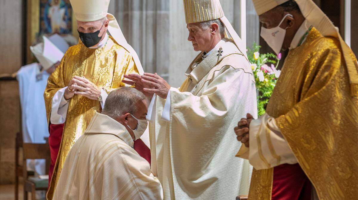 Cardinal Blase J. Cupich, archbishop of Chicago, second from right, served as principal consecrator for the Mass of ordination and installation of the Most Rev. Michael G. McGovern as the ninth bishop of the Catholic Diocese of Belleville. Also pictured are co-consecrators, former Belleville Bishop Edward K. Braxton, right, and Bishop George J. Rassas, auxiliary bishop emeritus of Chicago.