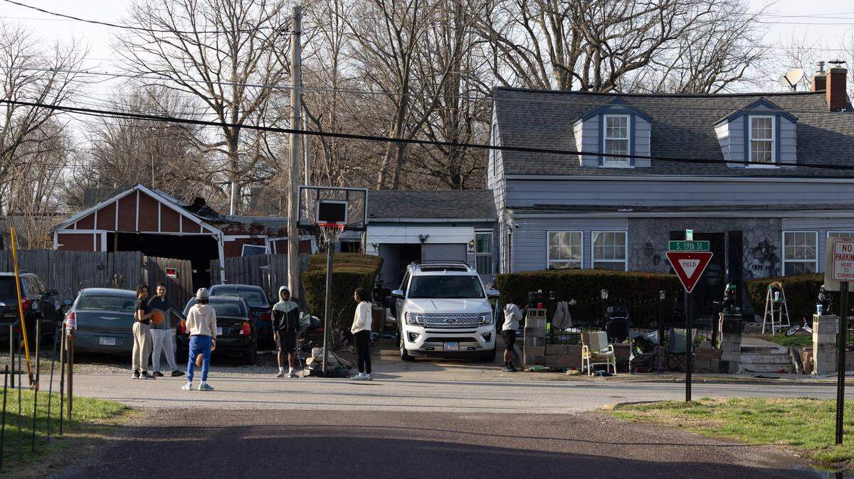 At least a dozen vehicles were parked on residential property owned by George Green on South 19th Street in Belleville on Thursday. City officials have issued multiple citations. alleging that his yard is a “nuisance” and that he’s illegally operating an auto-repair business.