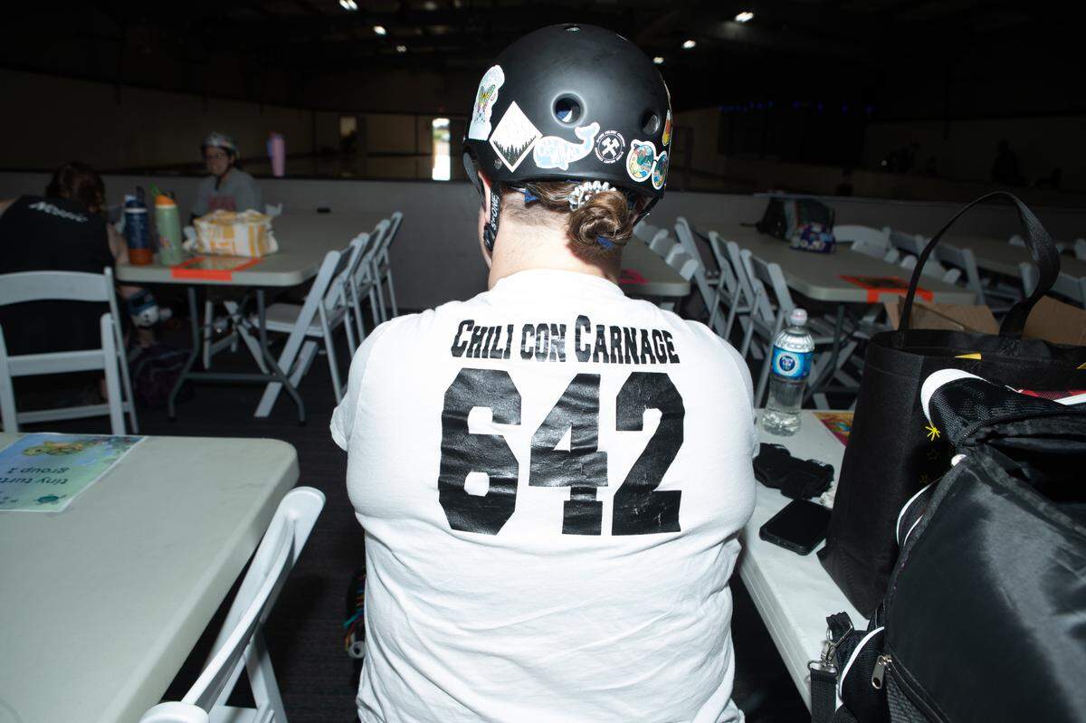 Roller Derby players typically have monikers, such as “Chili Con Carnage,” as seen here.