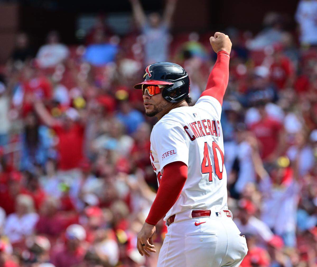 Apr 13, 2025; St. Louis, Missouri, USA; St. Louis Cardinals first baseman Willson Contreras (40) celebrates as he heads home after a two-run home run in the eighth inning by St. Louis Cardinals outfielder Jordan Walker (18) against the Philadelphia Phillies at Busch Stadium. Mandatory Credit: Tim Vizer-Imagn Images