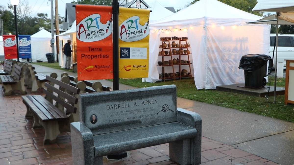 A cold, rainy night marked the start of this year’s Art in the Park in Highland Friday, Oct. 12, as vendors showed their wares under tents at a preview party.