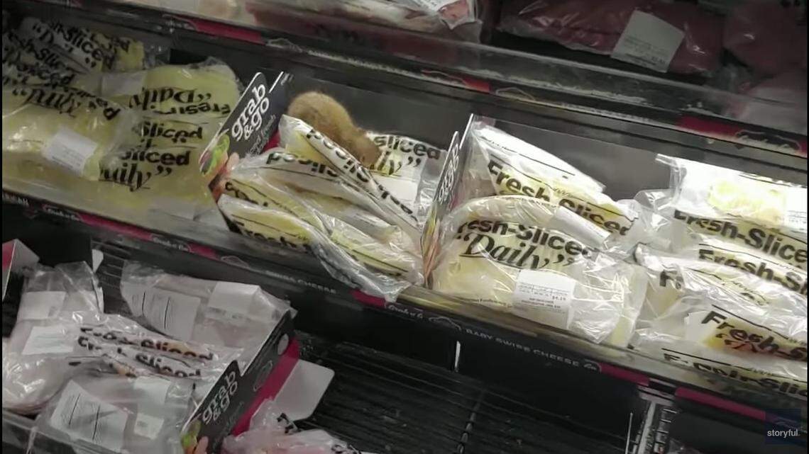 A rodent was caught on video eating a package of cheese in a Food 4 Less in Alsip, Illinois, officials say. Screengrab from Storyful.