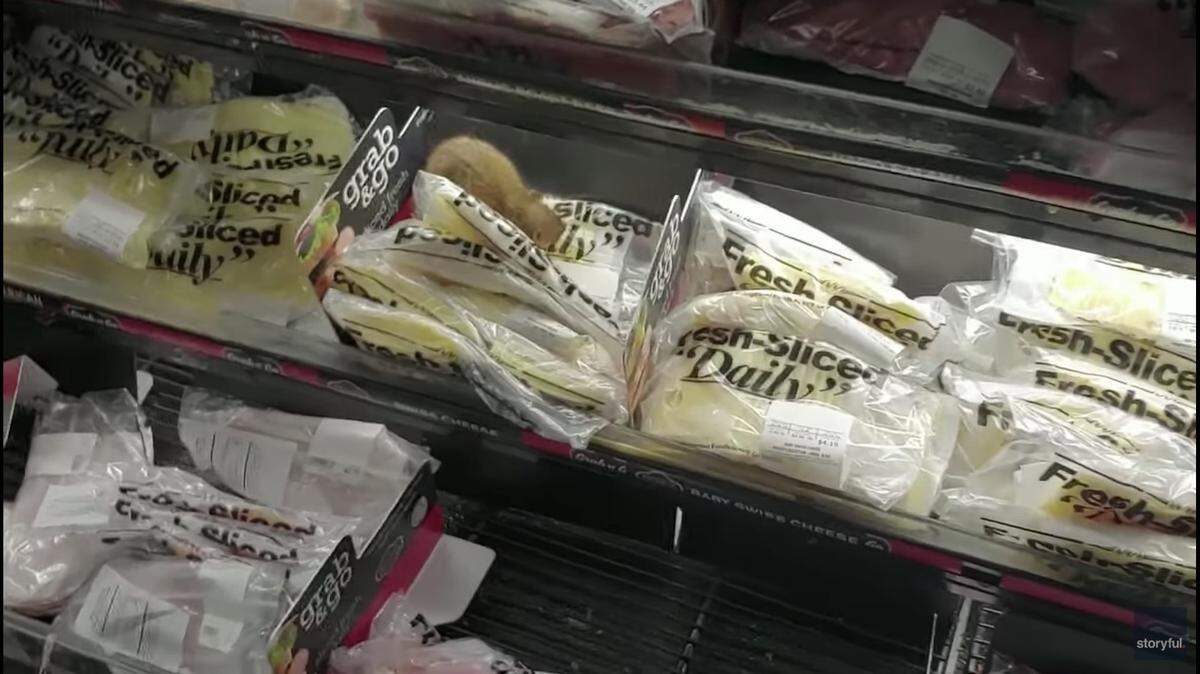 A rodent was caught on video eating a package of cheese in a Food 4 Less in Alsip, Illinois, officials say. Screengrab from Storyful.