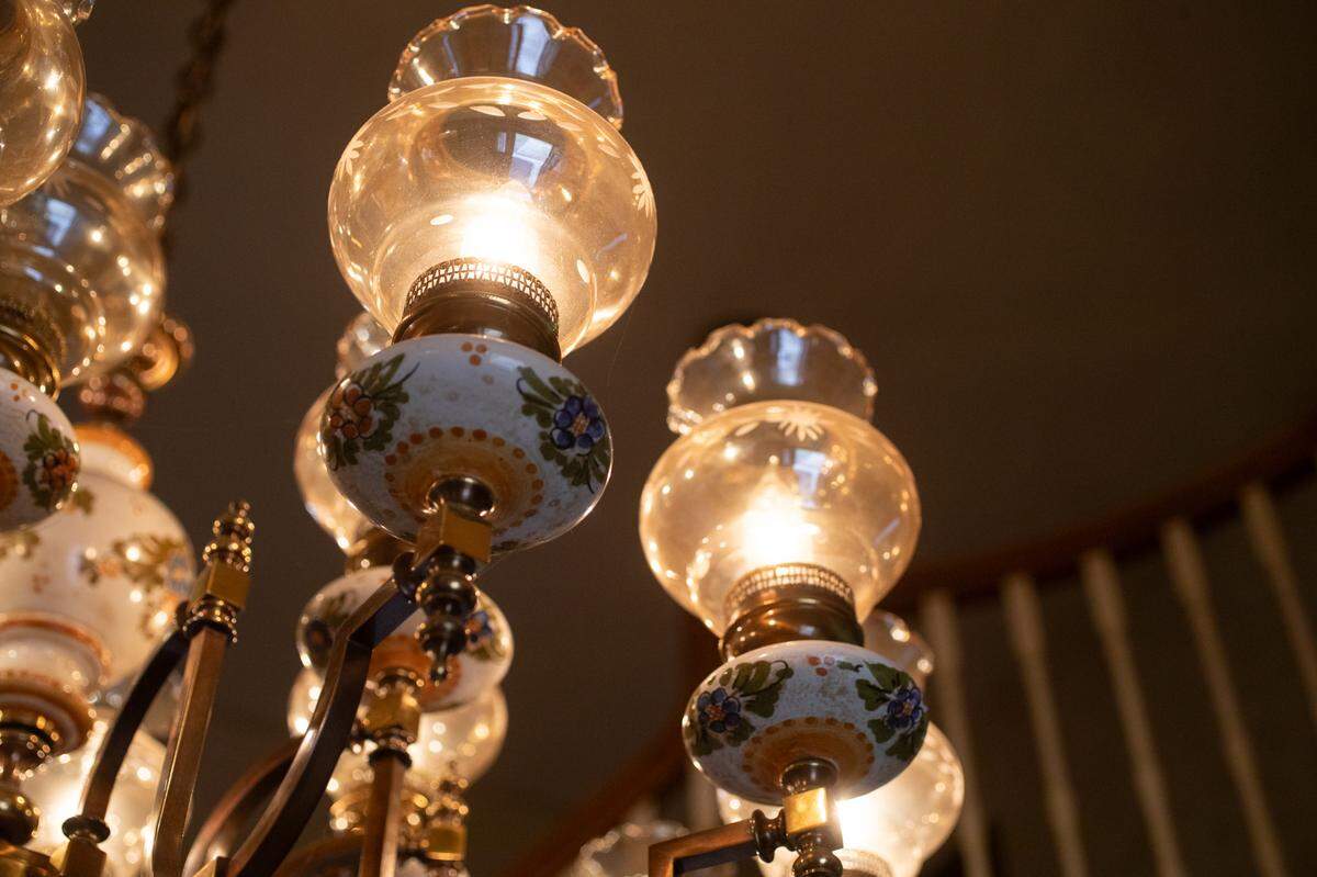 Upon entering the front door, one is greeted by an elegant, custom-made chandelier providing relaxing warm light. Many such chandeliers line the halls and rooms of the Granite City mansion.