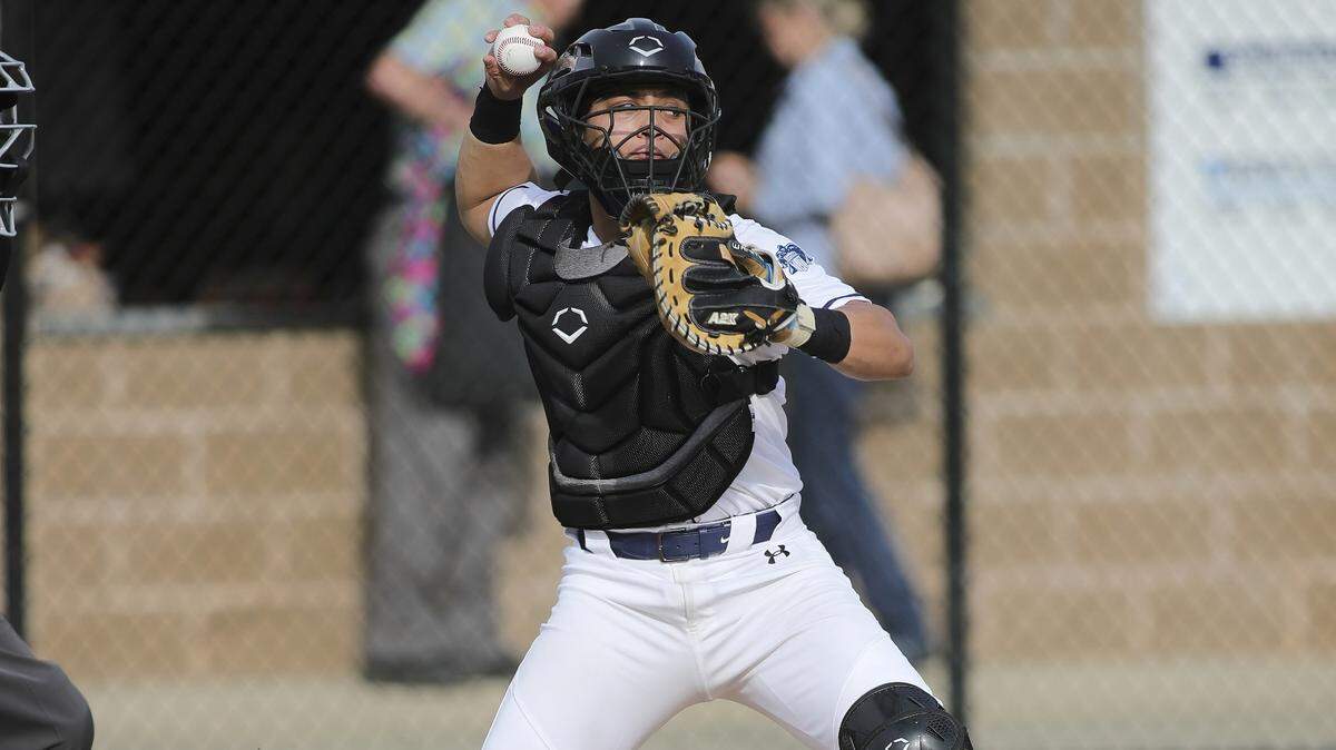Belleville East’s Pat Mendiola guns down a Belleville West runner attempting to steal second base Tuesday, April 4, during a Southwestern Conference game. The Lancers and Maroons faced off in the IHSA Class 4A Belleville East Regional semifinals Thursday, May 25, with the Maroons posting a 3-2 victory.