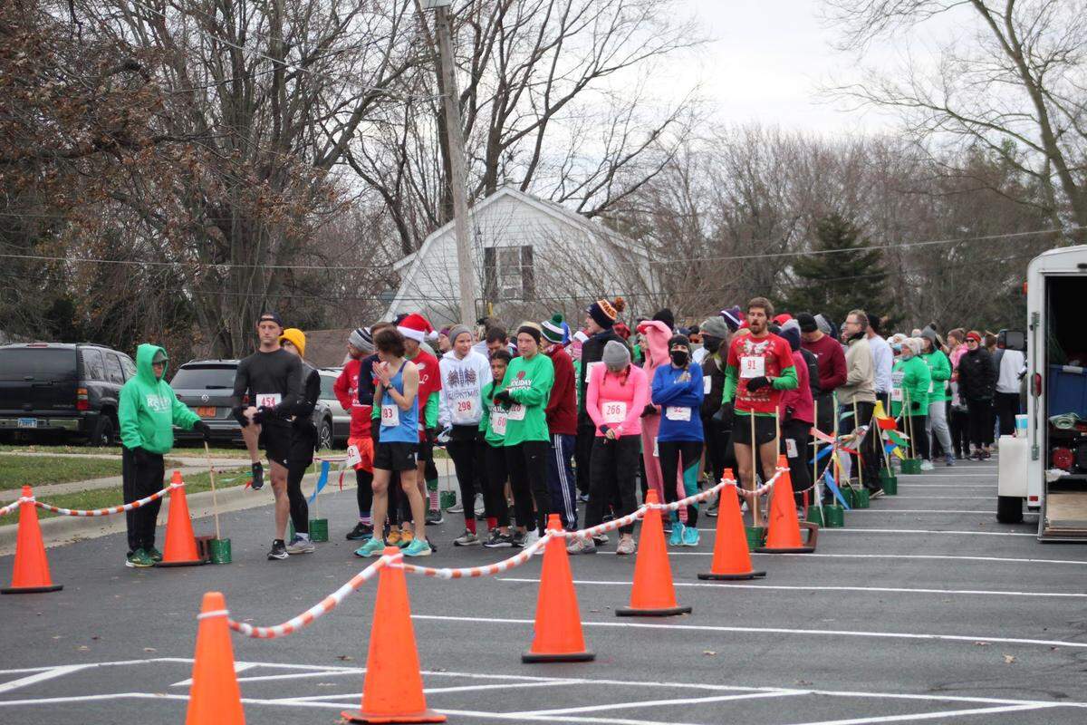 Runners participates in the annual Holiday Hilltop 5K Run/Walk in Shiloh. Event Director Neil Jansen said over $280,000 has been raised during the past 10 years to benefit a young person battling a challenging medical condition.