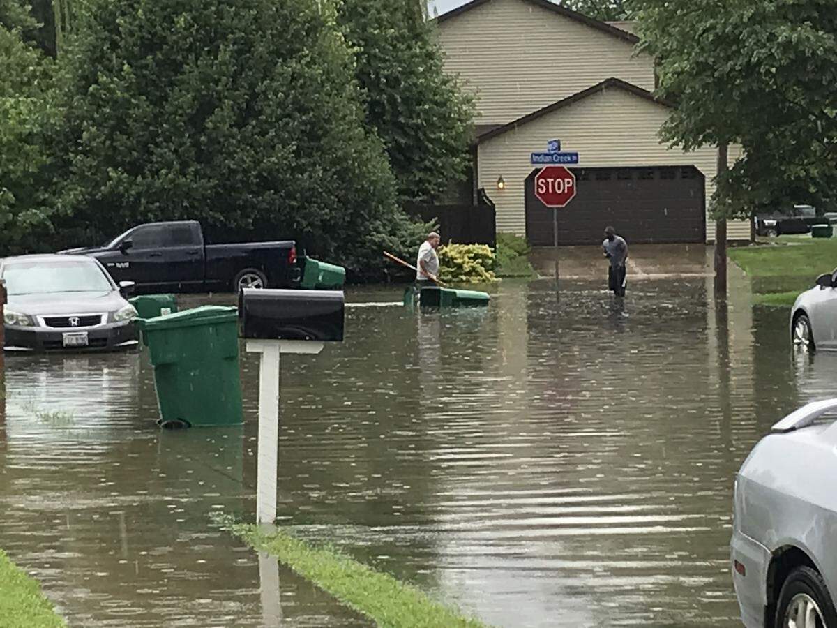 Streets were flooded at Highcliff and Indian Creek in O’Fallon after a downpour dumped about 2 inches of rain Monday on O’Fallon in about 20 minutes.