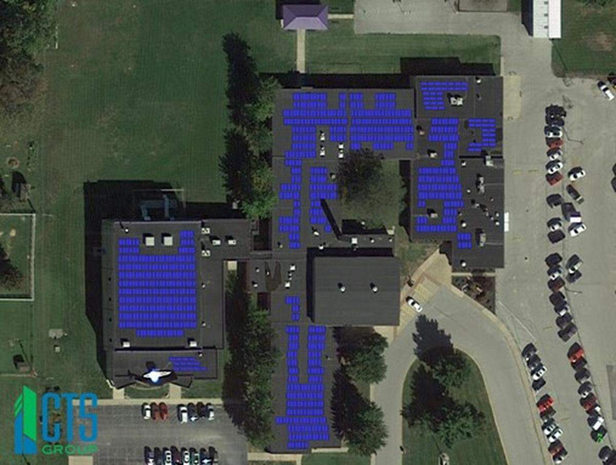 This computer-generated image shows how solar panels will cover the roofs of connected buildings that house Harmony Intermediate School and Emge Junior High in Belleville.