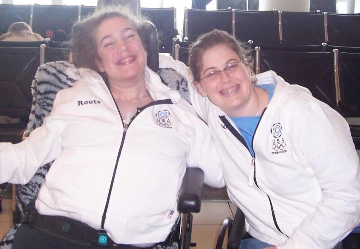 Sarah Delashmit, right, shown in 2006, fabricated a family and life while carrying on an 11-year friendship with Erin Johnson.