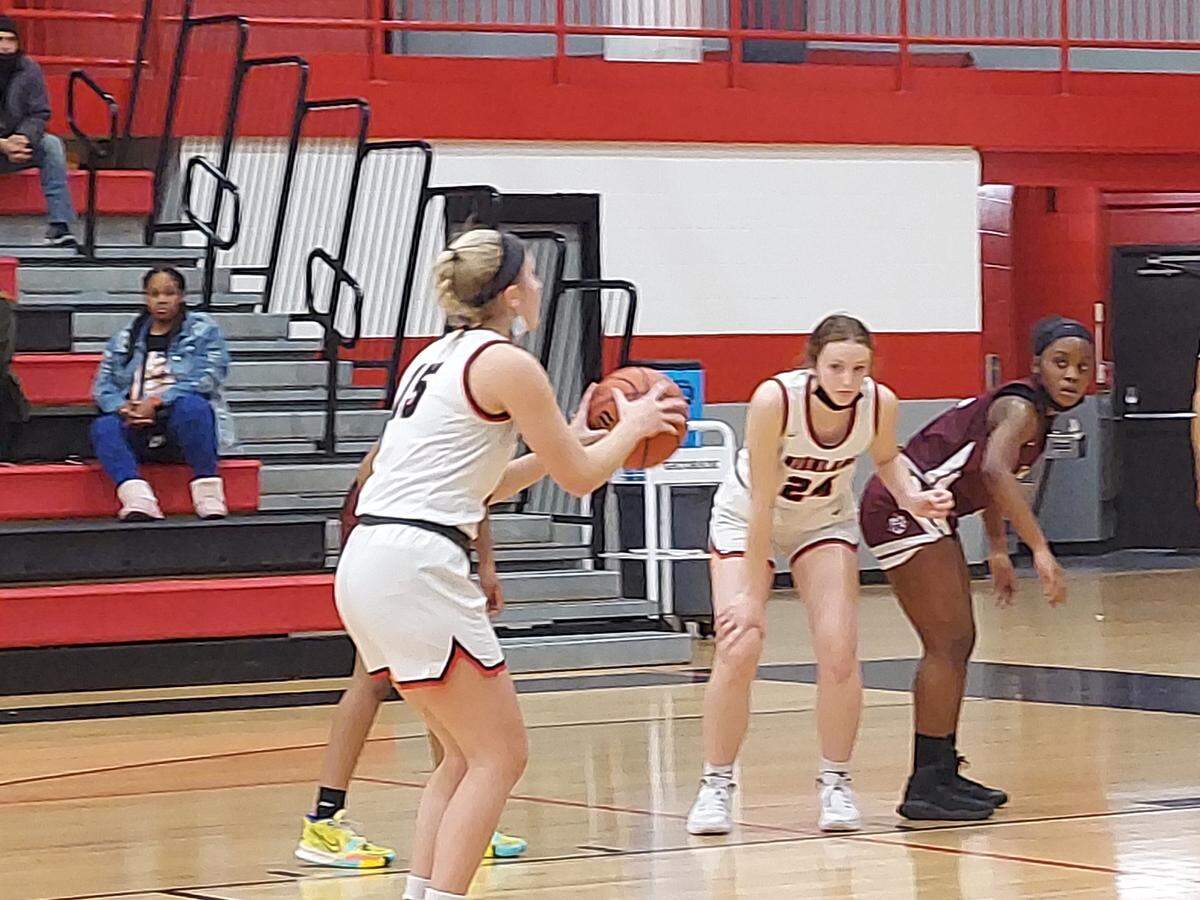 Highland’s Grace Wilke sets to shoot a free throw during the second quarter of a non-conference game against Belleville West at Highland High School. Wilke led Highland with a team-high 10 points, but the Lady Bulldogs ultimately fell 61-28.