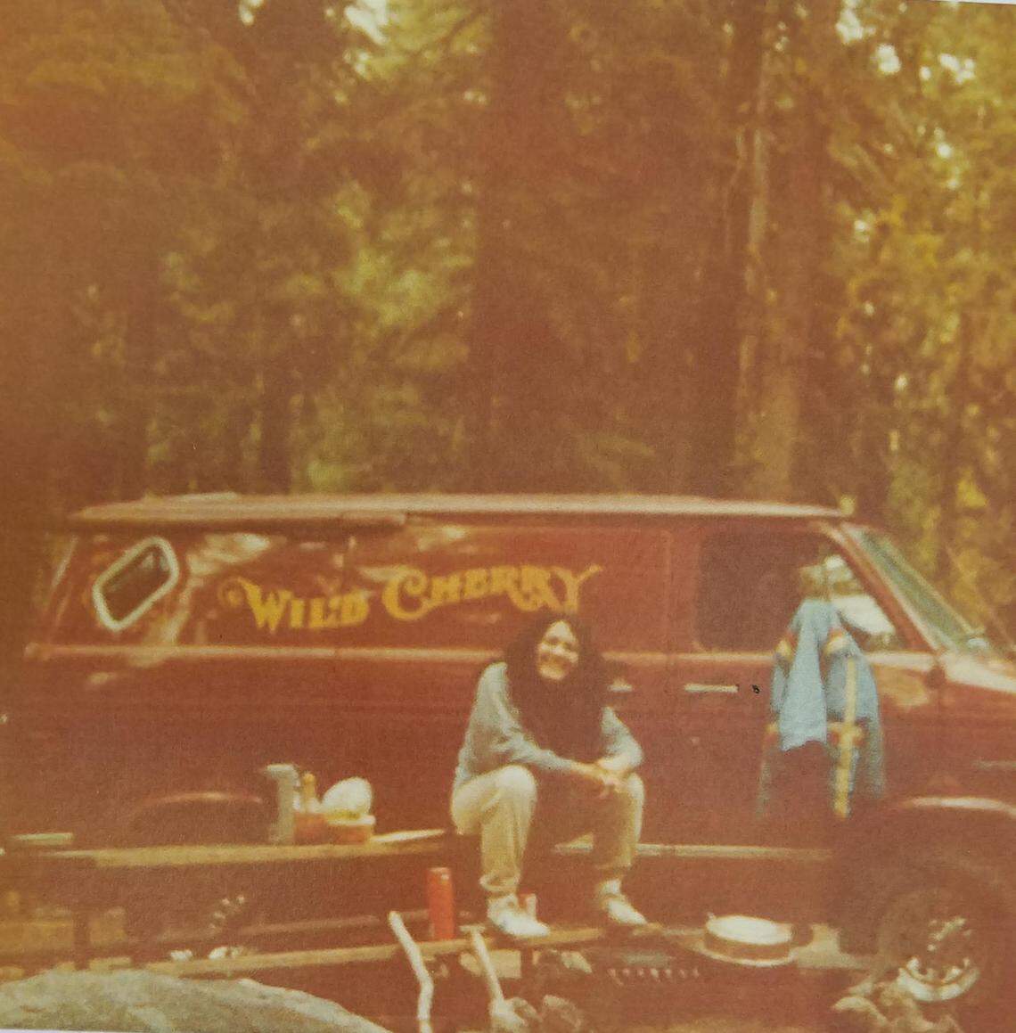 Laura Godin poses in front of the Wild Cherry van during a trip to Yosemite National Park in 1981. Her husband, Steven, bought the van from a neighbor the year before.