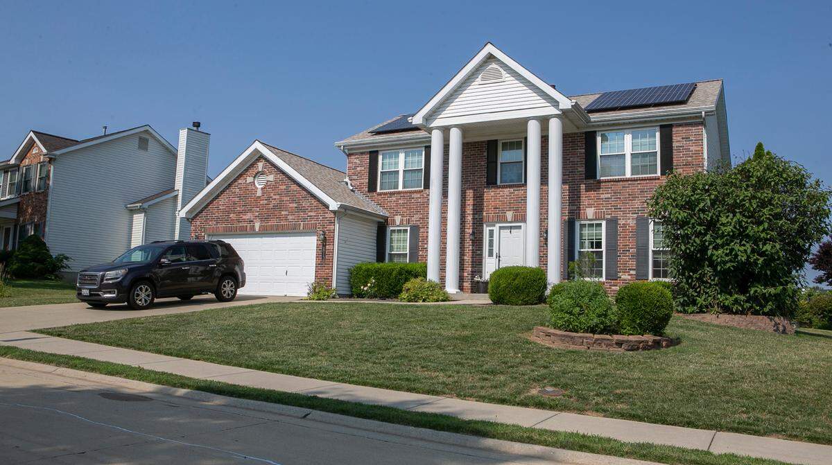 This photo shows solar panels on the front-facing roof of the Bassler home at The Orchards in Belleville, as seen from the street. The homeowners association has argued that they violate subdivision rules.