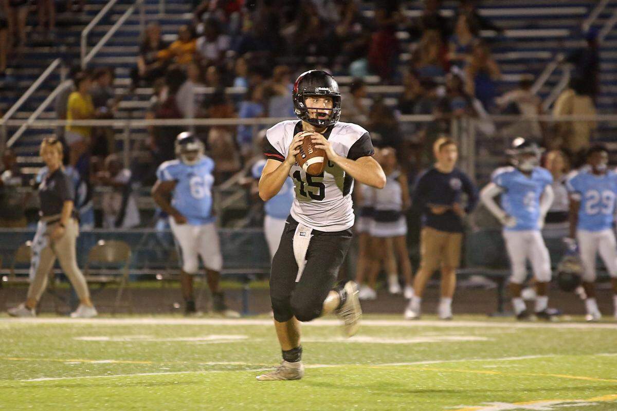 Highland quarterback Jack Etter completed 8 of 9 passes for 159 yards and three touchdowns in a 35-7 win over Belleville East Friday. Etter returned an intercepted pass for a score.