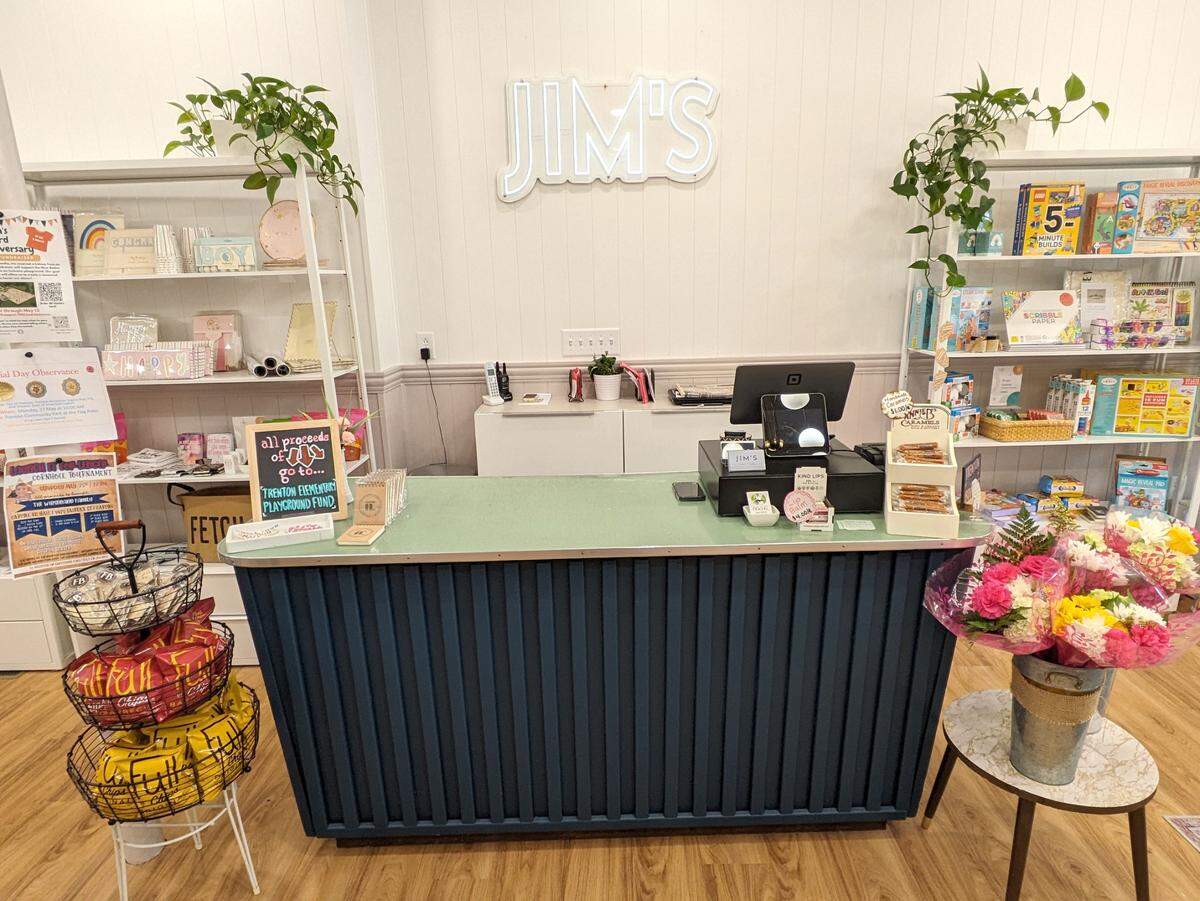 The front counter at Jim’s Suits & Tuxedos in Trenton is a repurposed vintage counter. The green top and metal trim is original.