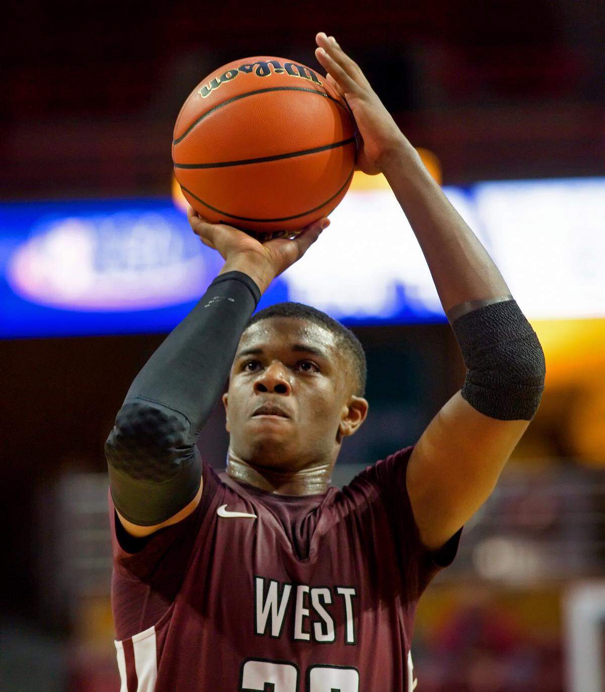 EJ Liddell takes a shot during the IHSA Class 4A Super Sectional game in 2019 as a member of the Belleville West Maroons.