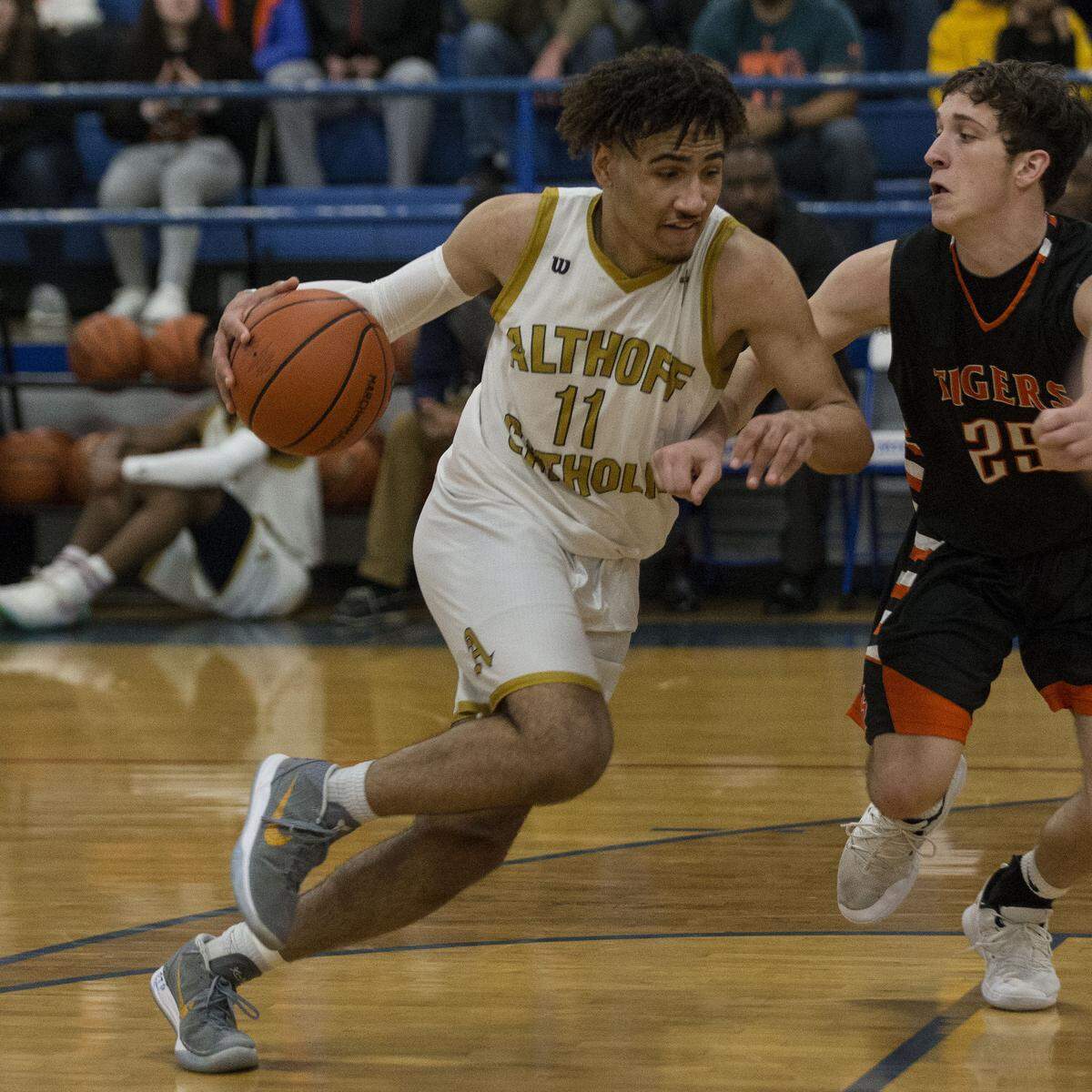 March 1, 2019 - Freeburg, IL - Belleville AlthoffÕs Greg Wells drives to the basket during the IHSA 3A Freeburg Regional Championship basketball game Friday night in Freeburg. Photo: Chris Johns