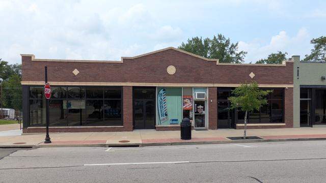 The Sports Page Lounge (on the right) and Rippin’ Rookies Cards & Collectibles (far left) are part of Phase Two of the Herald Square expansion in Collinsville.